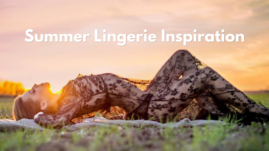 A model in black lace summer lingerie poses in a field at sunset, showcasing a stunning silhouette